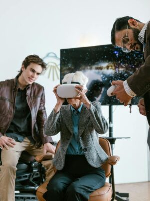 A diverse business team exploring virtual reality technology indoors.